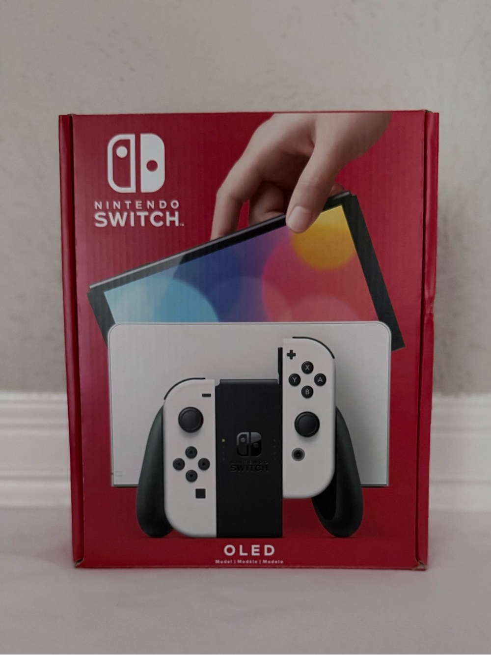 New Nintendo Switch Console Oled White 64 GB Open Box never played.